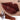 ANTHEMY Erosion Matrix Lip Gloss in #G02 Espresso with applicator, swatch, and glossy brown lips