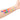 Colorful matte makeup swatches displayed on a forearm against a white background