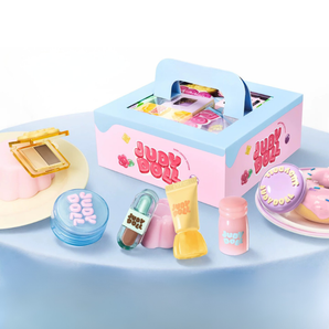 JUDYDOLL Mini Makeup Gift Set in a colorful handled gift box with assorted mini makeup products
