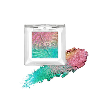 NOIRICORN Astral Archive Alien Flora single eyeshadow in clear compact with pink and turquoise pigment swatches