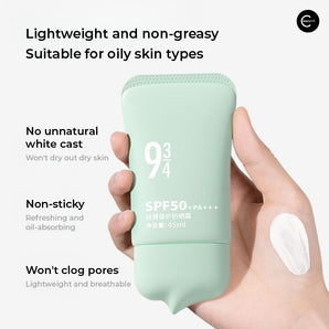 934 sunscreen lotion tube held in hand beside a swatch of white lotion