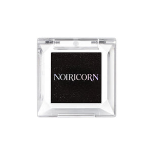 Fard à paupières NOIRICORN Noir Spark dans un boîtier carré transparent, vue de face