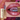 MEEYA SHOW glitter lipstick with purple-blue shimmer shown on lips