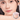 SPENNY 921# blush compact beside a model wearing the light nude-pink shade
