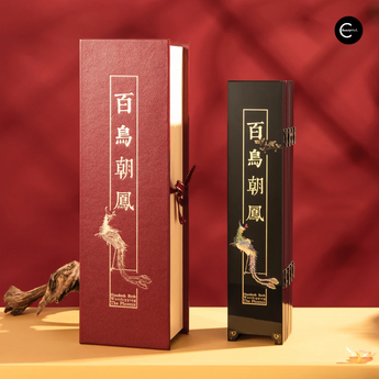 Red and black 百鸟朝凤 small folding screen packaging, front view.